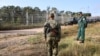 Bulgaria has reinforced its 259-kilometer southeastern frontier with non-EU member Turkey with a barbed-wire fence, but the barrier has been damaged amid a surge of people trying to cross.