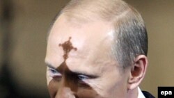 Vladimir Putin, leader of the faithful?