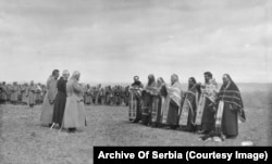 Serbian priests hold a Mass.