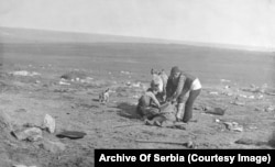 Children scavenging at an abandoned Turkish position.