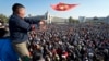 People protest during a rally against the results of a parliamentary vote in Bishkek on October 5, 2020.