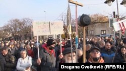 Protesters against the proposed changes have gathered in cities across Serbia.