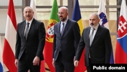 European Council President Charles Michel (center) hosts talks between Azerbaijani President Ilham Aliyev (left) and Armenian Prime Minister Nikol Pashinian earlier this year. 