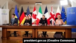 Ukrainian President Volodymyr Zelenskiy, Canadian Prime Minister Justin Trudeau, Italian Prime Minister Georgia Meloni, and EU Commission President Ursula von der Leyen speak in Kyiv during a G7 conference in February.