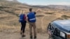 Monitors from the EU Mission in Armenia, Ema Stastna (left) and Thomas Tartarin, on patrol in between the villages of Gomk and Zaritap.