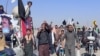 Protesters march on November 19 against Pakistan's new travel regulations at the Chaman crossing with Afghanistan. 