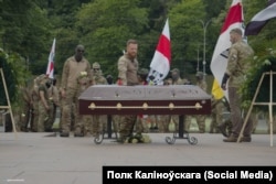 A funeral is held in Kyiv of Belarusian volunteer fighter Miraslau Lazouski on May 25, 2023.