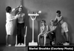 Weighing children at a health camp, Saligorsk district, Minsk region, 1996