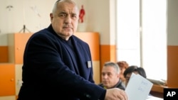 Former Bulgarian Prime Minister Boyko Borisov casts his vote at a polling station in Bankya, on the outskirts of Sofia, on April 2.