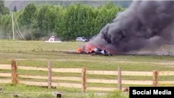 Emergency officials said the helicopter fell and started burning after its blades hit an electrical wiring pole while landing.