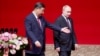 Chinese leader Xi Jinping (left) and Russian President Vladimir Putin in Beijing on May 16 during a two-day state visit. 