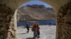 Afghans visit Band-e Amir national park in Bamiyan earlier this month.