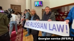 Journalists protested against the draft bill at Georgia's parliament in Tbilisi on February 20.