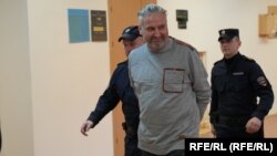 Oleg Belousov appears in court in in St. Petersburg on March 29.