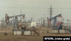 Oil derrick pumps in Zhetybai