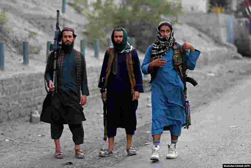 Armed Taliban security personal stand guard near the historic border crossing on September 6 after travel was suspended. Pakistan was one of only three countries to grant formal recognition to the previous Taliban government of 1996&ndash;2001. This time, Pakistan, like all other countries, has withheld recognition.