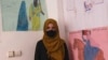 A female student attends a clandestine school in southern Afghanistan.
