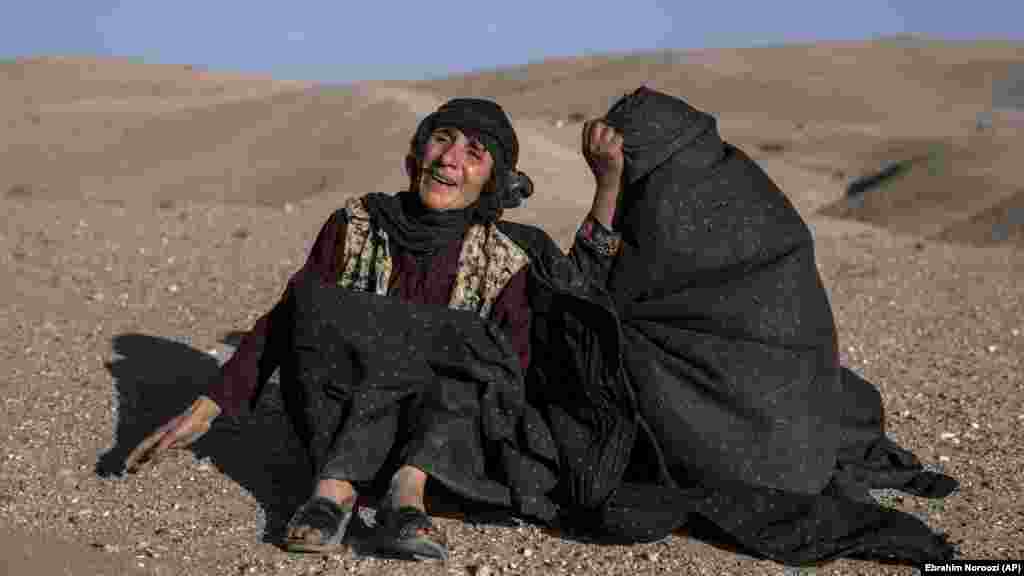 Afghan women mourn the death of relatives who were killed in the earthquakes.