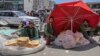 Afghan vendors sell bread on a roadside in Kabul.