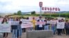 Activists block a road from Stepanakert, the capital of the Nagorno-Karabakh enclave, to Azerbaijani Aghdan to decry conditions in the region in Askeran on July 18.