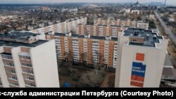 Newly reconstructed apartment blocks in Mariupol
-- Residents, and even some workers, say the quality of the effort is questionable. 