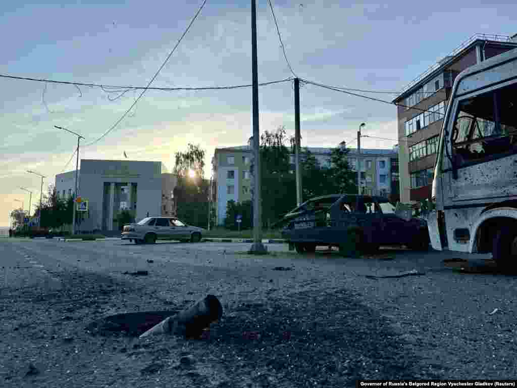 Remnants of rocket artillery are seen on the street near Shebekino&#39;s courthouse (on left in background).&nbsp; The rocket strike came one week after an armed incursion into the Belgorod region launched from Ukrainian territory by anti-Putin Russian militants, and a day after several apparent Kamikaze drones were spotted flying over Moscow.&nbsp;