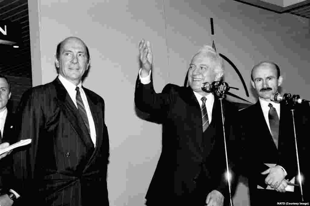 Eduard Shevardnadze (center) the Soviet Union&#39;s Foreign Minister during a visit to NATO&#39;s headquarters in Belgium in December 1989.&nbsp; After the fall of the Berlin Wall in November 1989, communism appeared to be retreating in Europe.&nbsp;