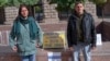 Irina Dmitrieva and Andrei Karpov protest in front of the Bulgarian government building in Sofia. 