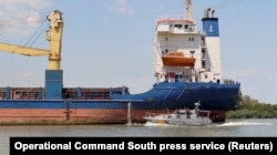 A container ship enters the Danube from the Black Sea with a Ukrainian Coast Guard escort in July.