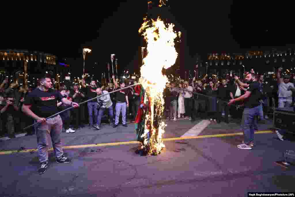 Turkish and Azerbaijani flags were set alight in the nation&#39;s capital. A century later, recognition of the killings as genocide is still a divisive diplomatic issue, with Turkey and Azerbaijan -- who share strong ethnic and cultural ties -- officially denying genocide took place.&nbsp; &nbsp;