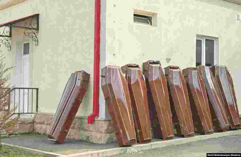 Coffins outside a morgue in Stepanakert on September 24. Funerals of ethnic Armenian soldiers and civilians took place on September 24 after Baku launched an attack on the Nagorno-Karabakh region, which the separatist authorities claim killed at least 200 people.&nbsp;