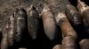 Remains of charred shells from the EMCO munitions depot near Karnobat, Bulgaria, after its previous fire last July.