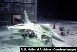 An F-16 during low temperature testing inside a room in the Mckinley climatic laboratory in Florida in 1982.