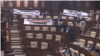 Lawmakers from the pro-Russian Communists and Socialists' Bloc protested against the bill during the session, holding up a banner reading, "Constitution of the Republic of Moldova: Moldova, Moldovans, the Moldovan way," among other slogans.