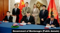 A contract signing between the Shandong consortium and representatives from the Montenegrin government, including Prime Minister Dritan Abazovic (standing, right), on March 29.