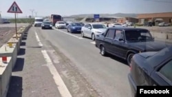 Protests ground traffic to a halt on the Yerevan-Gyumri highway in Armenia on April 28.