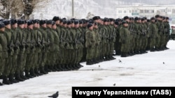 Russian soldiers attend a ceremony marking the end of combat training for mobilized men in the Eastern Military District on October 31.