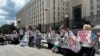 Women demand the return of husbands and sons from Ukraine outside the Defense Ministry in Moscow at a previous demonstration in June.