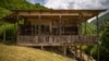 The traditional wooden homes in Gogolati feature intricately carved balconies.