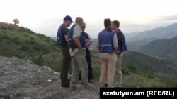 EU observers follow the humanitarian help going to Nagorno-Karabakh from Armenia on July 26.