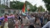 Hundreds of people strolled the streets waving rainbow flags and banners promoting tolerance.