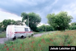 An ambulance rushes from the front line near Avdiyivka.