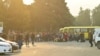 Residents gather next to buses in central Stepanakert before leaving Nagorno-Karabakh amid a mass exodus of the ethnic Armenian population last week.