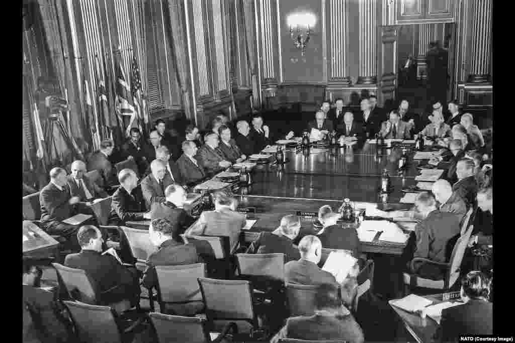 This image shows the first meeting of the North Atlantic Council in September 1949. One month before this Washington D.C. meeting, a treaty signed by the United States, Canada, the United Kingdom, and nine other European countries came into force, heralding the foundation of the North Atlantic Treaty Organization.&nbsp;