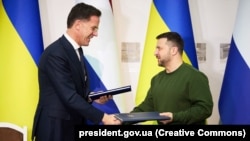 Mark Rutte (left), then-Dutch prime minister who is the now the incoming NATO secretary-general, meets with Ukrainian President Volodymyr Zelenskiy in Kharkiv on March 1.