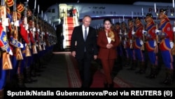 Russian President Vladimir Putin is greeted by a welcoming ceremony upon his arrival at an airport in Ulan Bator on September 2.