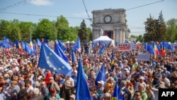 People take part in a pro-EU rally in Chisinau on May 21.