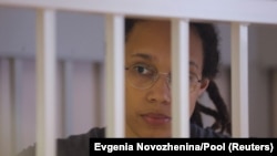 U.S. basketball player Brittney Griner inside a defendants' cage during the reading of the court's verdict in Khimki outside Moscow on August 4. 