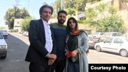 Sepideh Rashno, pictured with her lawyer and brother following her release on August 30, arrested on June 15 after a video of her arguing with another woman who was enforcing rules on wearing a head scarf on a bus in Tehran went viral.