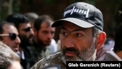 Armenian opposition leader Nikol Pashinian walks before a ceremony to commemorate the 103rd anniversary of mass killing of Armenians by Ottoman Turks, in central Yerevan, April 24, 2018